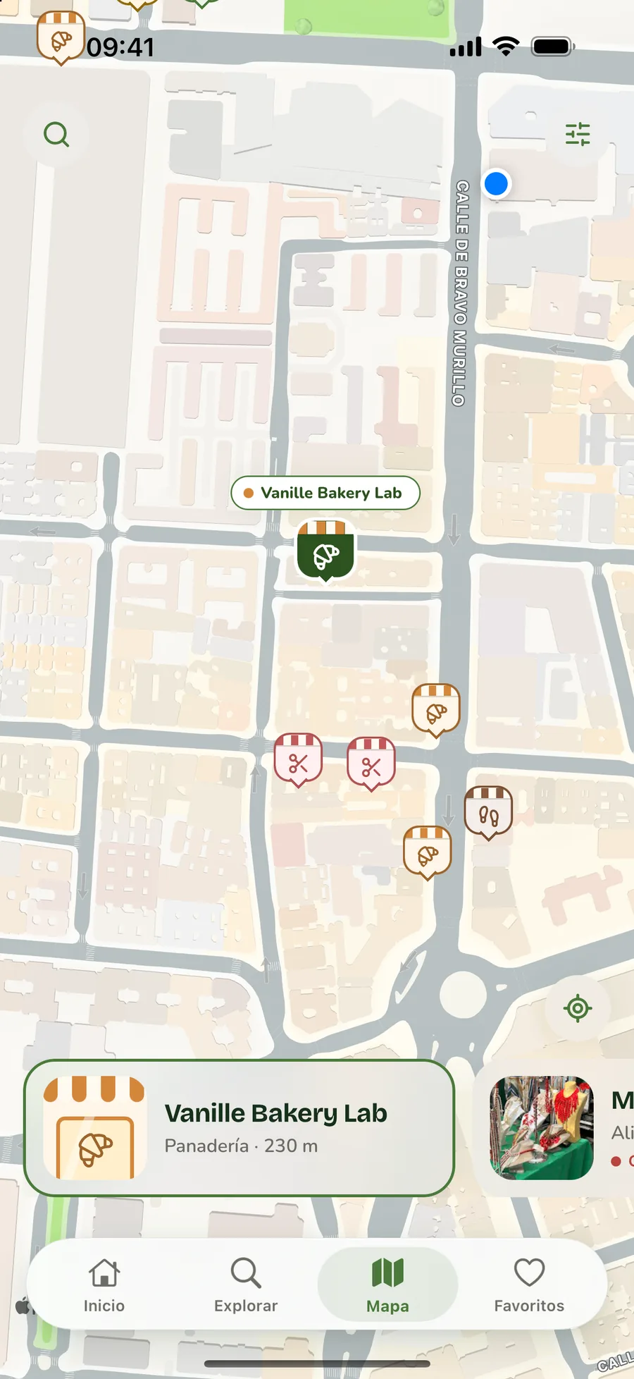 Pantalla del mapa de Auzoko con comercios cercanos señalados por categoría.